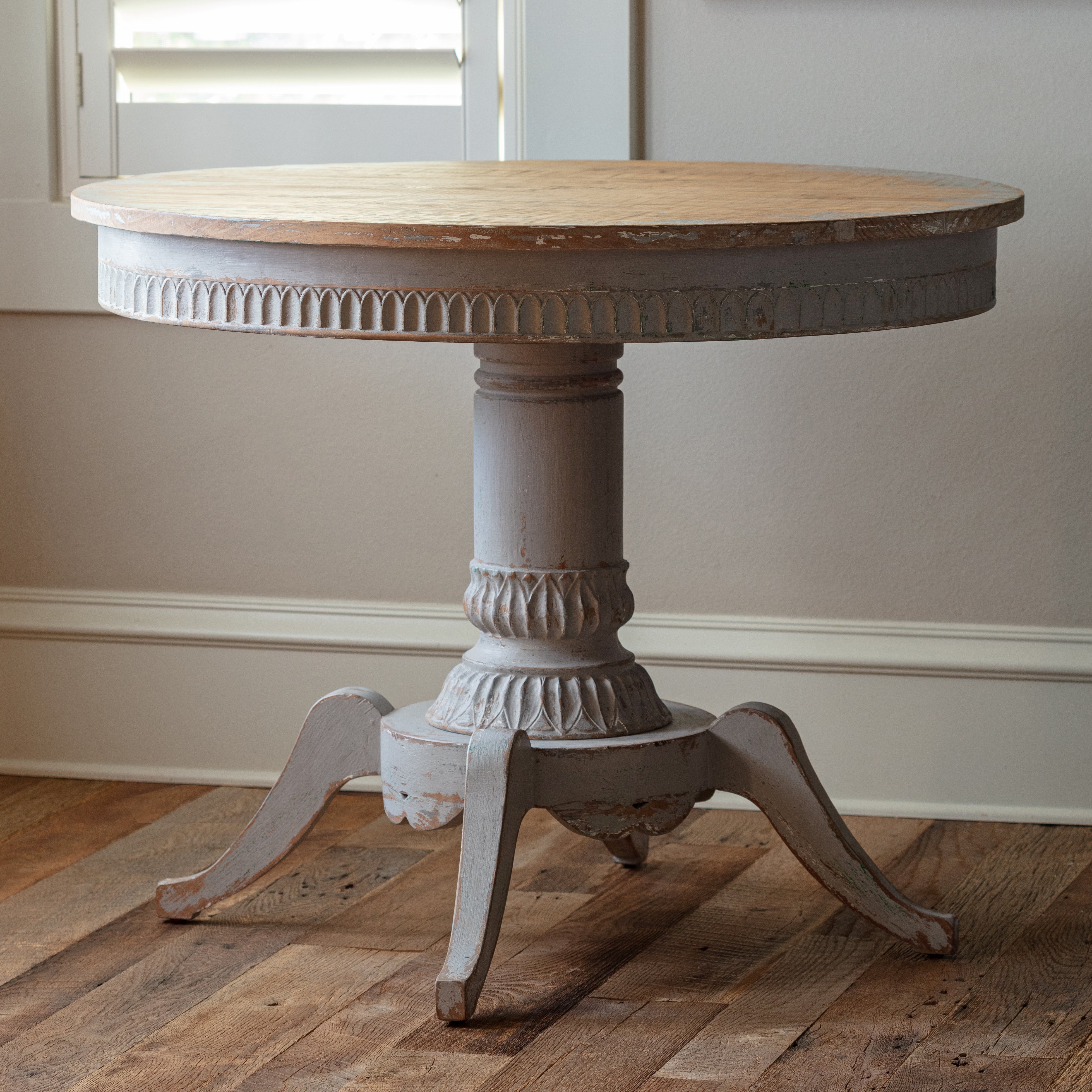 Sion Round Pedestal Table